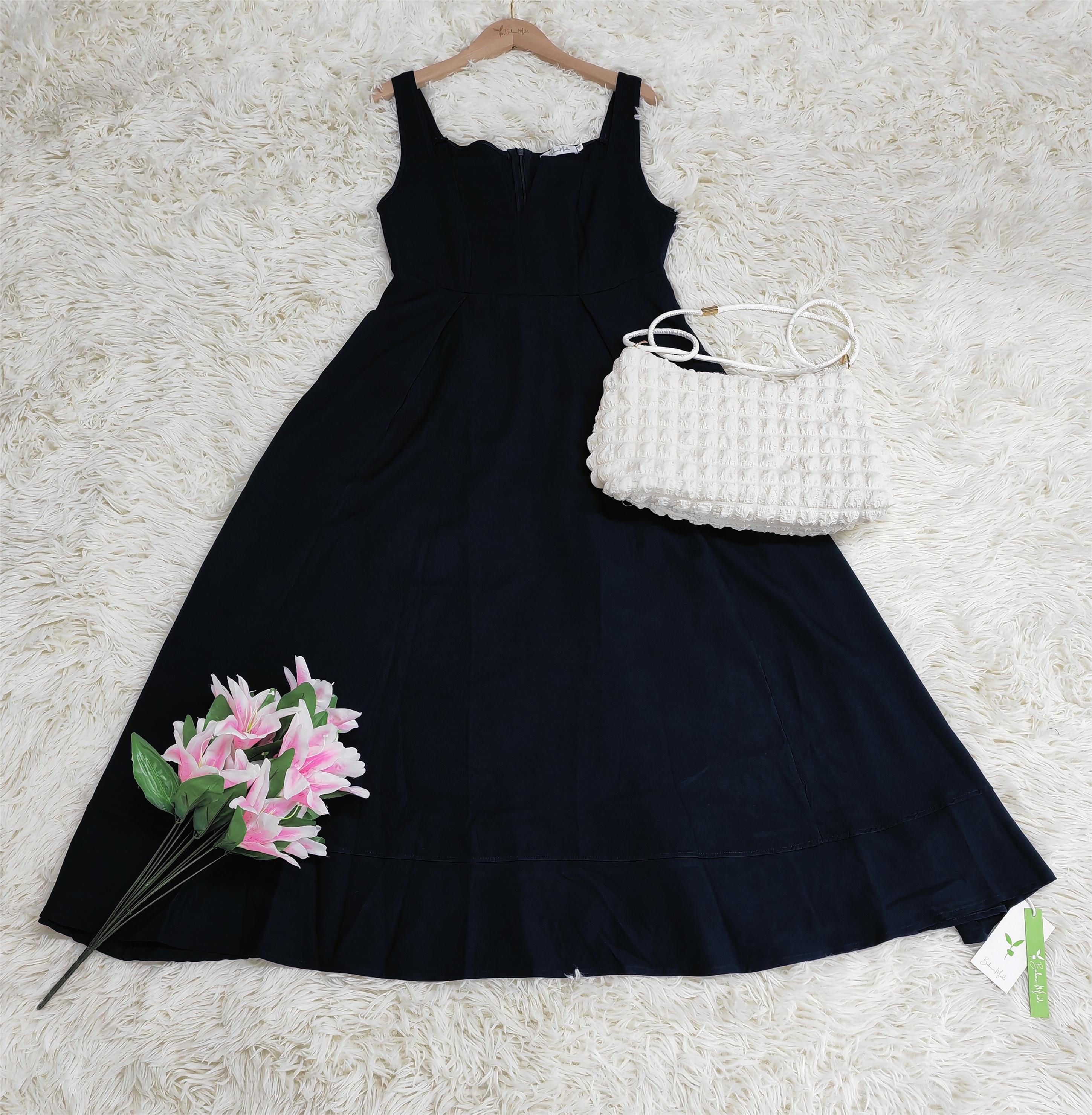 SpringStil - Schickes Midikleid mit Empire-Taille und Riemen