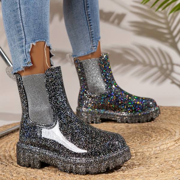 Glitzernde Plateaustiefel