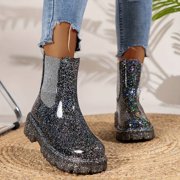 Glitzernde Plateaustiefel