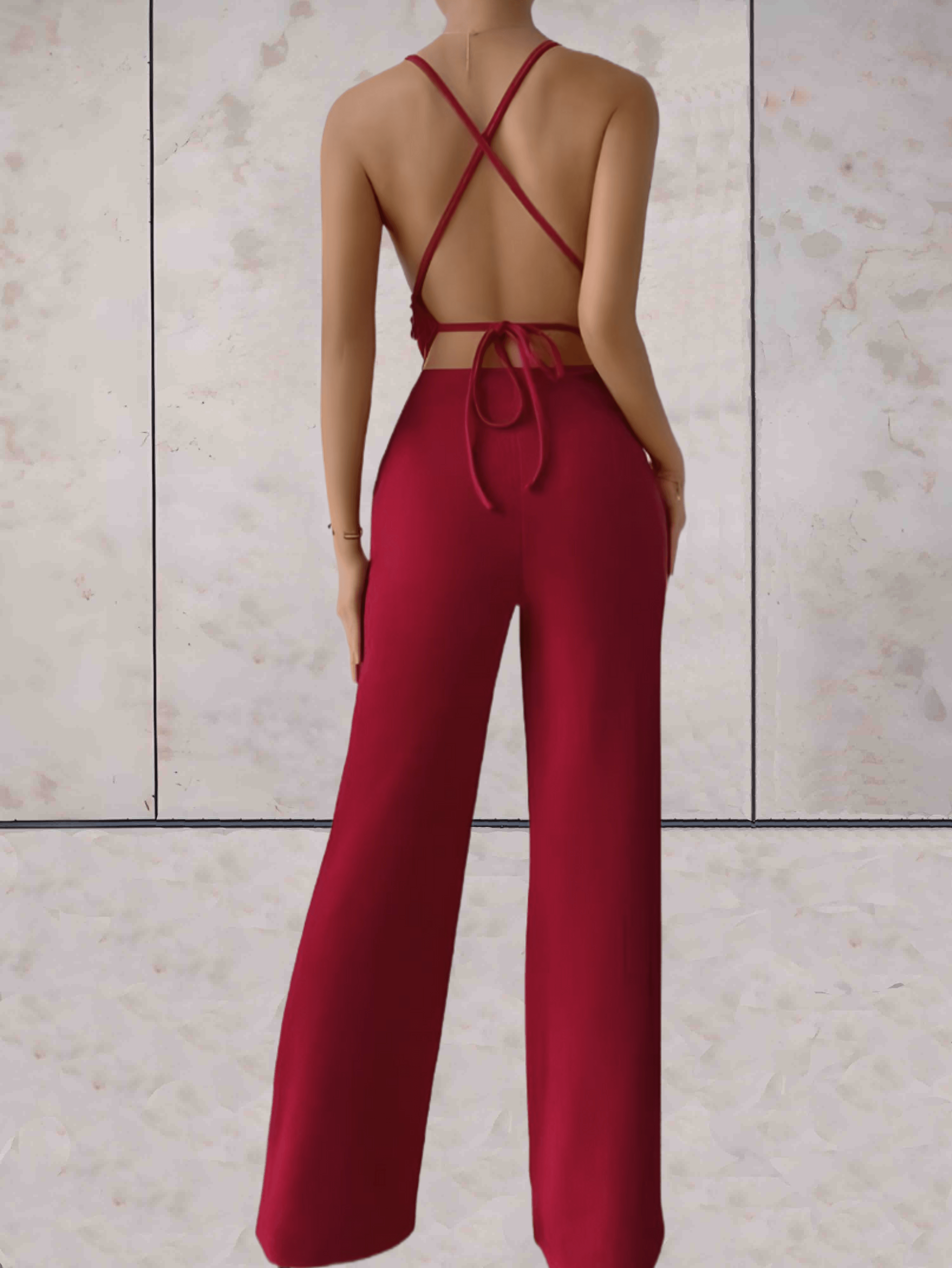 Brianna | Schicker Jumpsuit mit tiefem V-Ausschnitt, ärmellos, rückenfrei und weitem Bein