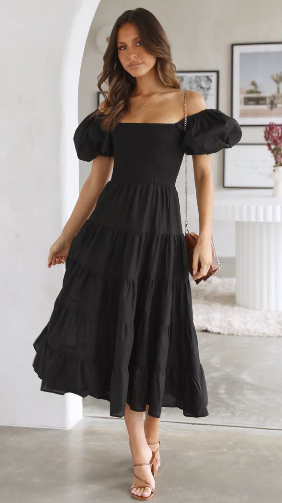 Schwarzes Midikleid mit Rüschen