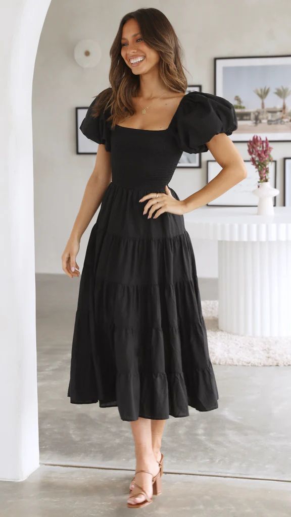 Schwarzes Midikleid mit Rüschen