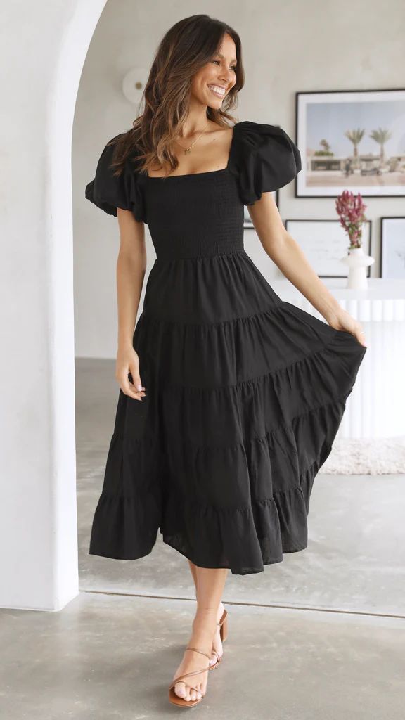 Schwarzes Midikleid mit Rüschen