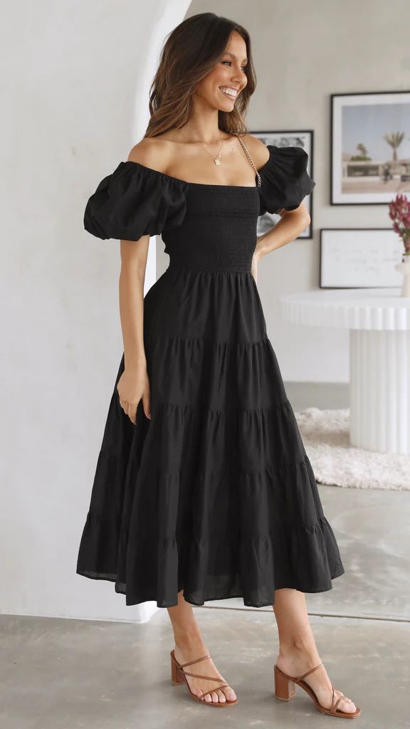 Schwarzes Midikleid mit Rüschen