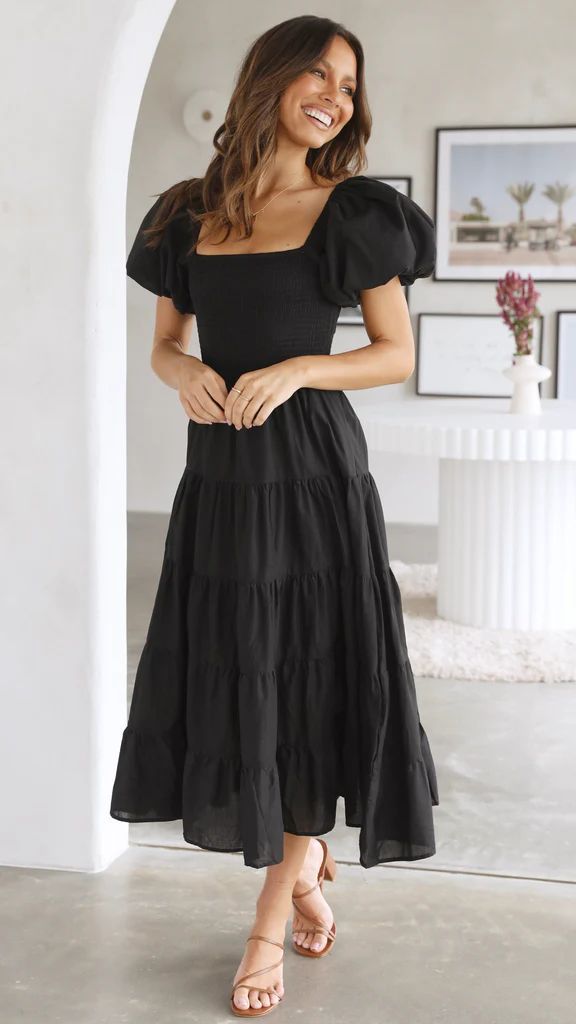 Schwarzes Midikleid mit Rüschen