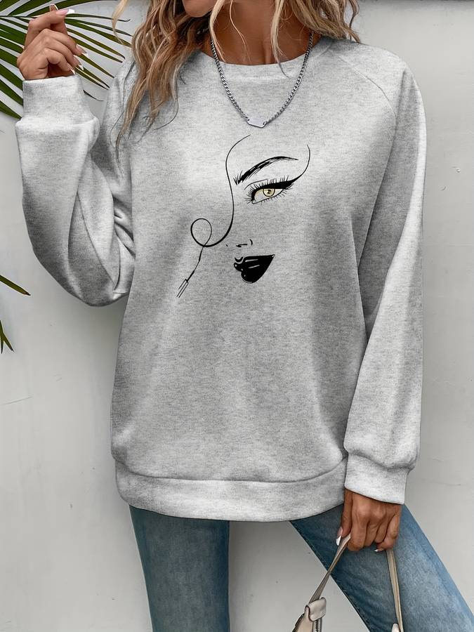 Niedlicher Pullover mit Gesichtsaufdruck