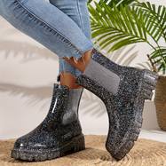 Glitzernde Plateaustiefel