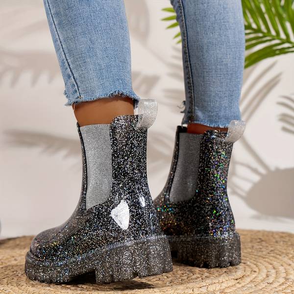 Glitzernde Plateaustiefel